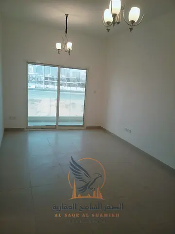 For annual rent in Ajman: a 2-bedroom apartment with a living room, 3 bathrooms, and an excellent layout, located in Princess Village, Al Yasmeen.