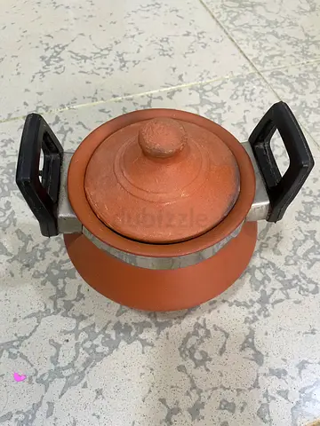 Traditional organic clay serving pot with lid