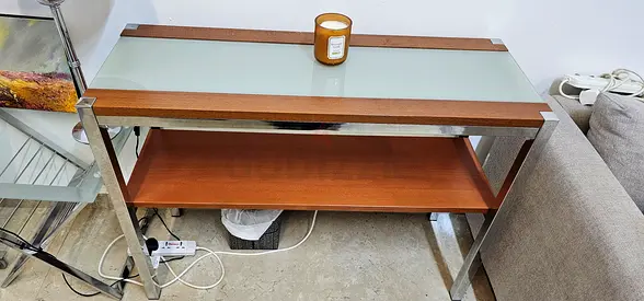 Glass-top wooden console table with metal frame - good condition