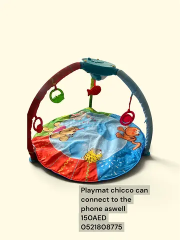 Chicco baby playmat with hanging toys and music