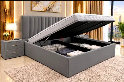 Grey fabric ottoman storage bed with upholstered headboard - King size