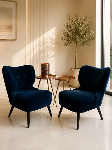 Pair of navy velvet accent chairs — modern lounge seating