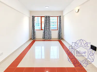 Near Burjuman metro spacious studio ( with covered parking)