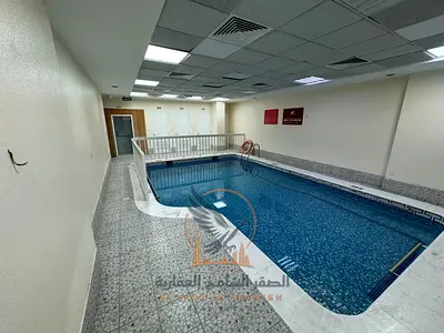 اقل سعر غرفتين وصاله في عجمان اطلاله مفتوحه علي المدينه مع بلكونه وخزائن حائط وجيم ومسبح