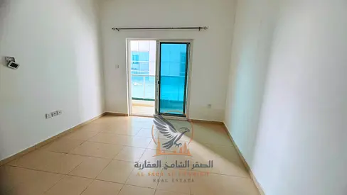 Premium 1BR apartment for annual rent with 2 baths balcony inside parking spacious layout prime location ready to move in right now