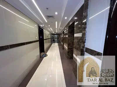 Apartment for annual rent in Al Majaz 3, Sharjah. 2 bedrooms and a living room. 3 bathrooms. Access to a gym and swimming pool. Includes a large terra