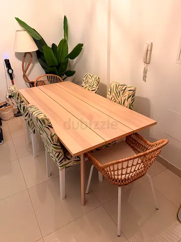 Ikea Light wood dining table with 6 chairs (compact set) - great condition.