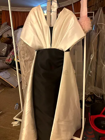 Elegant black and white evening gown with satin overlay, size unknown