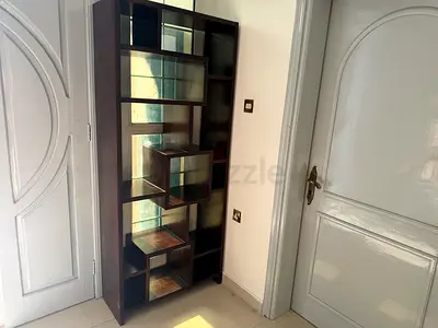 Dark wood geometric display bookcase / shelving unit - good condition