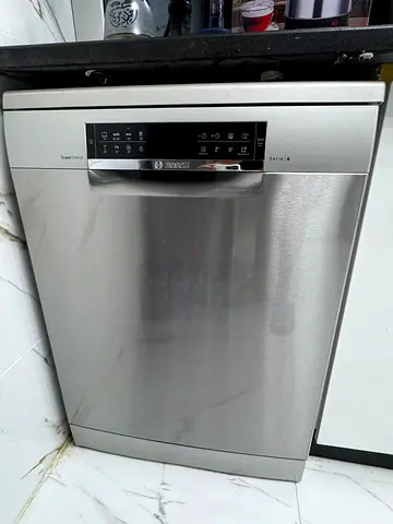 Stainless steel freestanding dishwasher in good working condition