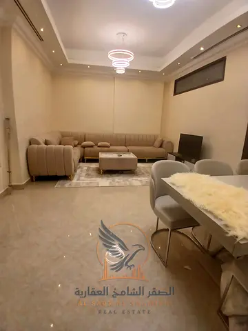 شقه مفروشه للايجارالشهري 3 غرف وصاله و3 حمام بالروضه علي مخرج دبي والشارقه بسعر مميز شامل الفواتير