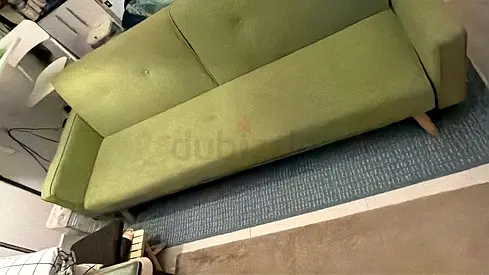 Green 3-seater Sofa cum bed in Good Condition
