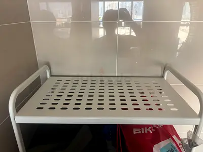 Small white metal utility trolley / storage shelf