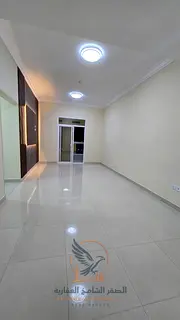 Two-bedroom apartment with a living room for annual rent in Ajman, Al Jurf 3, near Al Qabail Center.