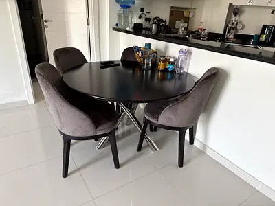 Round dining table with 4 upholstered chairs - good condition