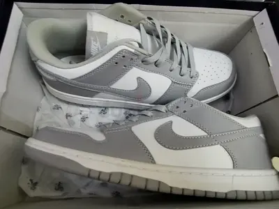 Original Nike Shoes. Dunk Low in white and light grey, size UK 10, US 11 available for Sale.