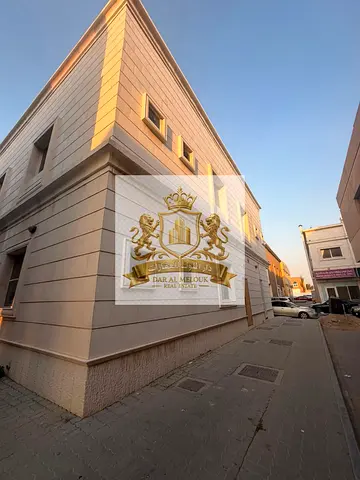 For sale: A residential-commercial building in Al-Yarmouk, with an area of ​​6 [units/plots/units of measurement—please specify].