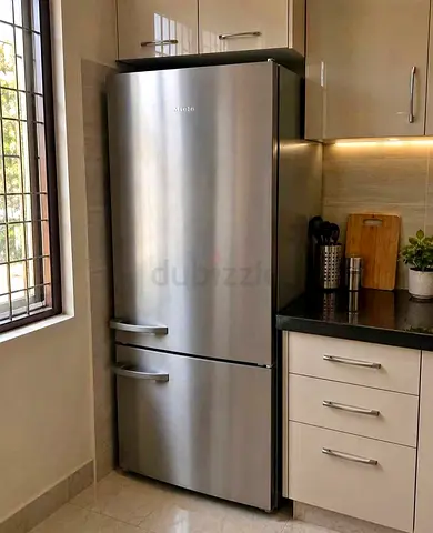 Miele bottom fridge and freezer new model slightly used