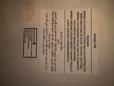 Marble-top table (label shown) — good condition