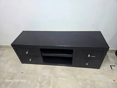 Used low-profile TV entertainment unit with drawers and shelves
