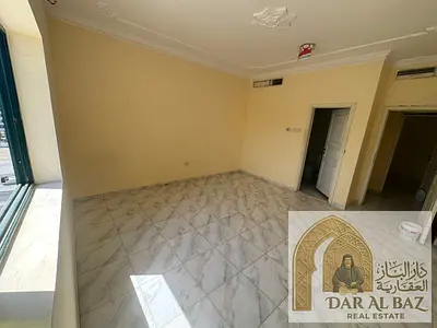 Three-bedroom apartment with a living room for annual rent. Located in Al Majaz 2, on Jamal Abdul Nasser Street. Features a sea view and central air c