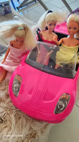 Pink barbieś car with dolls