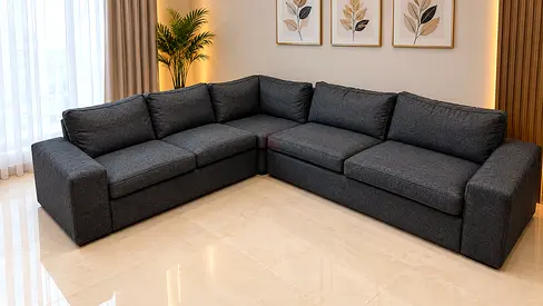Dark grey modular L-shaped fabric sofa — good condition