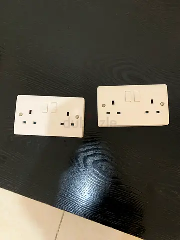 Pair of white UK double power sockets (wall-mounted) - used