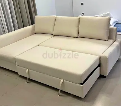 Beige L-shaped Sofa Bed with Storage - Good Condition