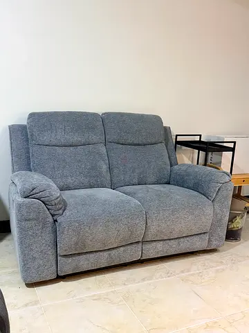 Gray 2-Seater Reclining Sofa - Comfortable, Good Condition