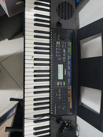 Yamaha keyboard with stand
