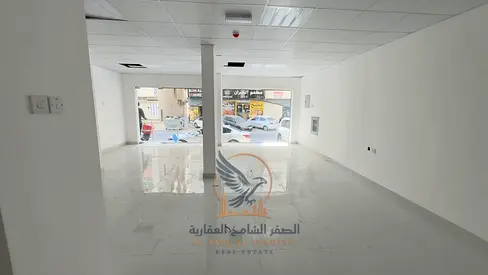 Prime commercial shop for rent in Industrial Area 2, spacious, on a main road behind Emirates Markets.