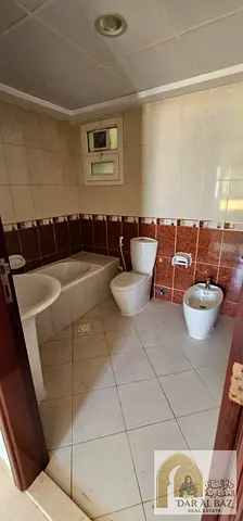 Excellent Apartment for Rent in Sharjah – Al Qasimia, Al Nad Location: Al Qasimia, near Nesto Apartment Features: 2 master bedrooms, a spacious livi