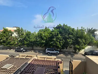 4-bedroom villa in Sharqan compound, majlis, 2 living rooms, pool, AED 105,000 yearly, 1 month free, 4 cheques, near Al Heera Beach.