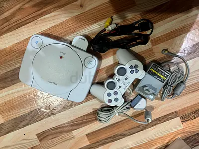 Sony PlayStation PS1 console with 1 controllers and cables - working condition