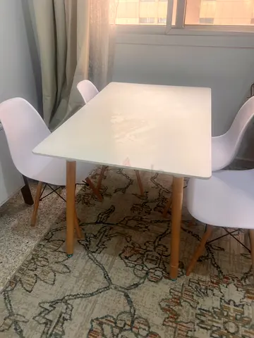 Homecenter white dining table with wooden legs - modern compact