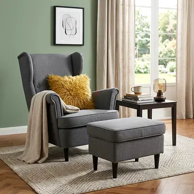 Grey wingback armchair with matching ottoman - good condition