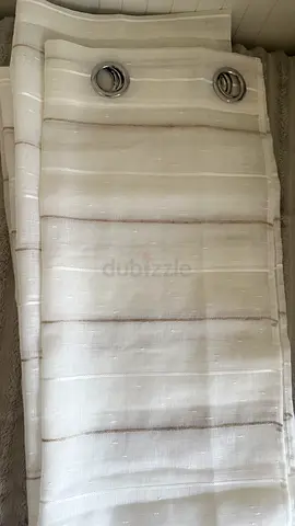 Light beige lined eyelet curtains — set of 2 panels