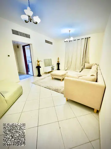 Apartment for monthly rent, consisting of one room and a living room, located in Al Nuaimiya 2, King Faisal Street, Al Hamoor Building.