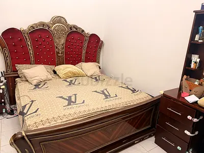 Ornate King Size Wooden Bed with Upholstered Headboard
