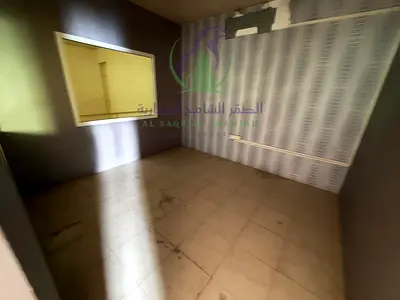 Shop for rent in Industrial Area 18, Sharjah, on a main road, featuring a mezzanine, 2,500 sq. ft., 3 rooms, 2 bathrooms, and fire and gas systems.