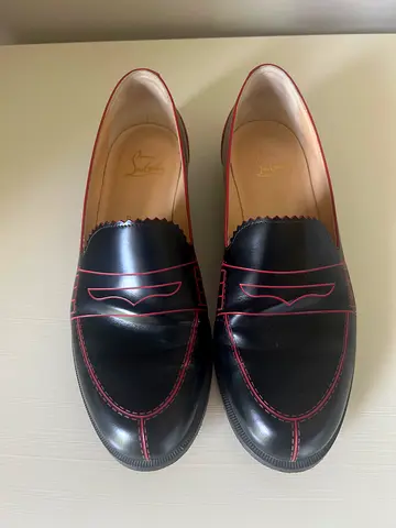 Christian Louboutin; Black leather loafers with red stitching - size EU 38- worn only 3 times-