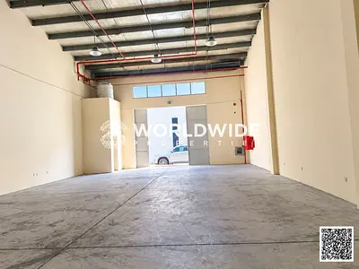 مستودع في الطابق الأرضي بمساحة 2500 قدم مربع | مساحة للتحميل والتفريغ بطول 10 أمتار | طاقة كهربائية بقدرة 25 كيلوواط | موقع متميز في "البهية" | أفضل ع