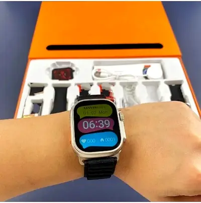 Ultra 7 in 1 Smart Watch with 7 Multi Color Bands – 2.1 Inch Screen, Waterproof, Wireless Charging,