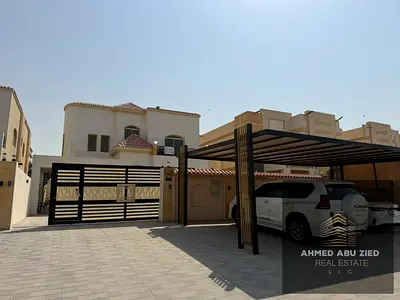 Al Rawda 3, Ajman | Asphalt Road | 5 Master Bedrooms, Outdoor Majlis, Spacious Living Room, Large Yard & Parking