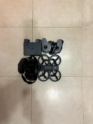 DJI Avata 2 FPV drone with controller, headset and spare batteries - used twice.