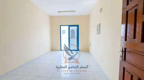 1BR Apartment for Annual Rent with 2 Balconies and Central AC Near Ajman University Etisalat and All Services Great Price and Location