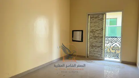 Two rooms and a living area with a balcony, located in Industrial Area 2 behind Emirates Markets.