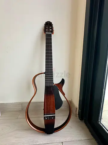 Yamaha Silent-Style Acoustic-Electric Travel Guitar (Wood Finish)
