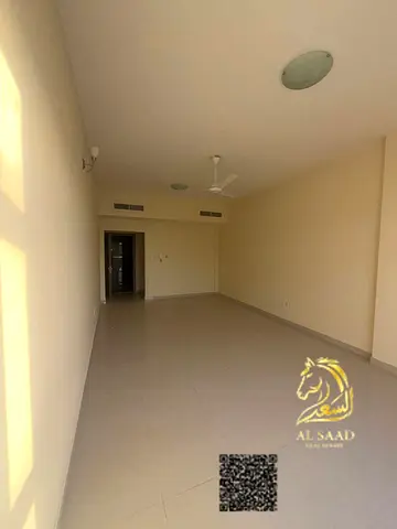 **كود B42 | شقة غرفتين وصالة للإيجار في المويهات 2 – عجمان**